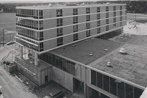 Black and white photo of early building at Fisher.