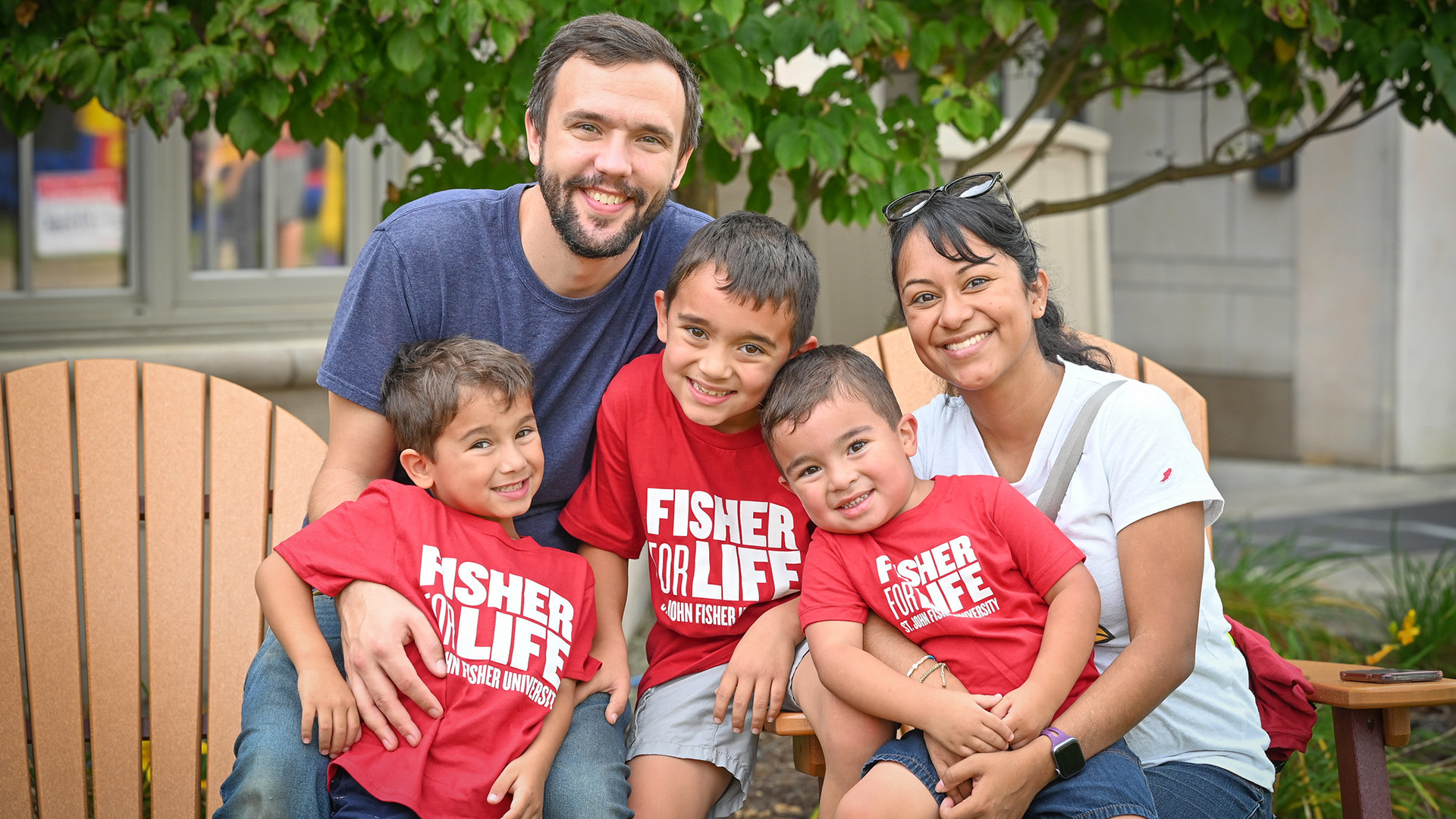 Parents and young children at the Fisher for Life Carnival.