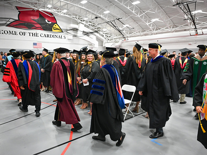 Faculty and staff leading graduates in the Commencement procession.