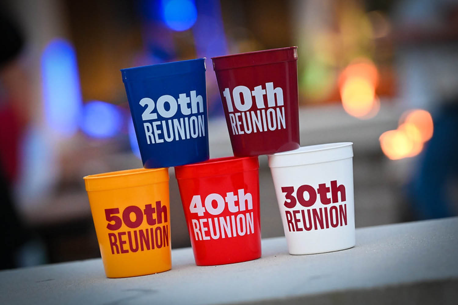 A display of cups with with reunion numbers