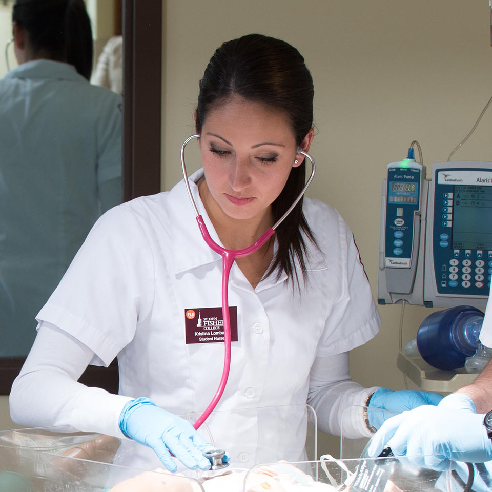 Nursing student in the simulation lab at Fisher.