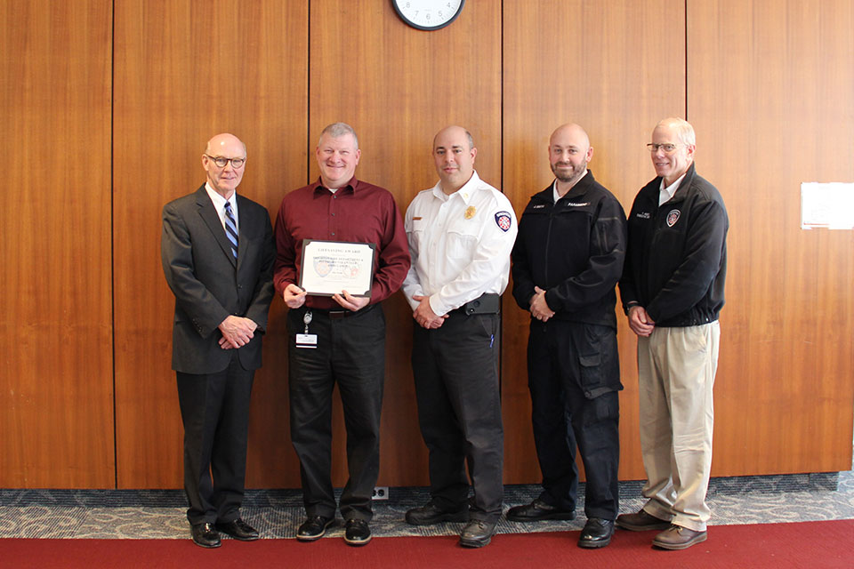 From left to right: President Rooney, Jim Grant, Aaron Hiller, Ted Aroesty, and Jon Smith.