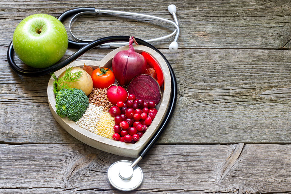 Hearty-healthy food arranged in a heart-shaped dish.