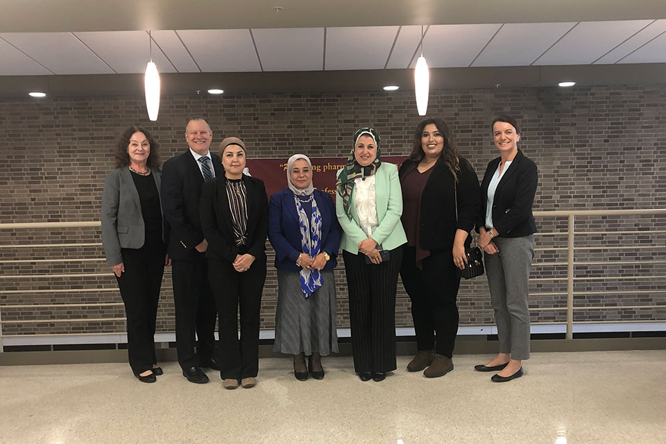 Future University faculty members Dr. Hayam Ateyya Abdelkawee Moussa, Dr. Naglaa Samir Ahmed Bazan, Dr. Ebtissam Abdelghaffar Metwally Darweesh, and Maha Magdy Mahmoud Ibrahim Sallam, with Fisher's Dr. Anna Ratka, Dr. Dave McAffrey, and Dean Christine Birnie.