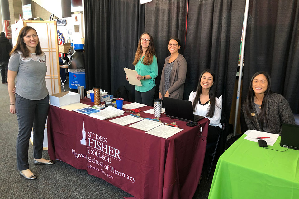 School of Pharmacy faculty and students, many of whom intern at Wegmans pharmacies, administered the immunizations during Project Homeless Connect's Day of Services.