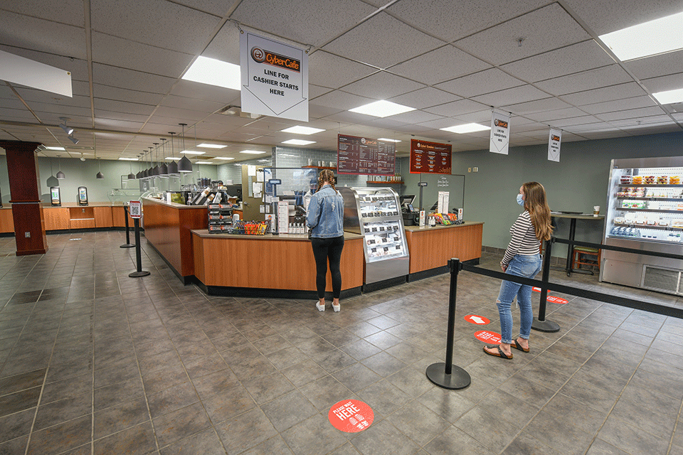 Students stand in line to order food at the newly renovated Cyber Cafe.