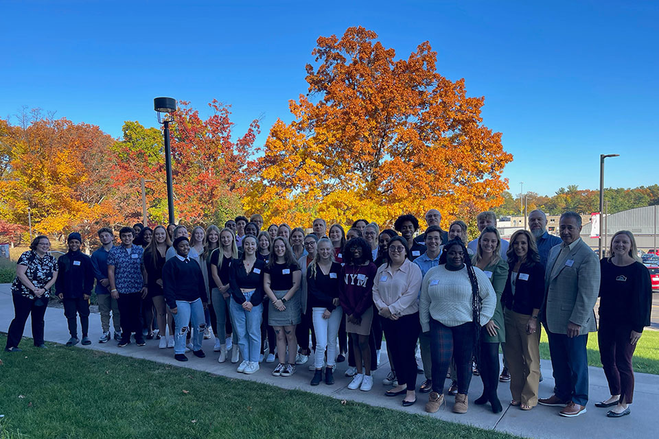 Students with members of the Constantino family.