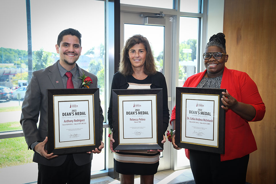 Fisher honored several graduates during the Alumni Awards Ceremony.