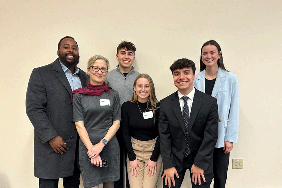 A team of Fisher faculty and students who volunteered at the Junior Achievement competition.