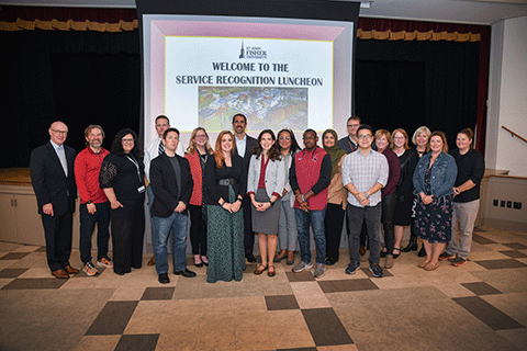 President Rooney with 10-year honorees