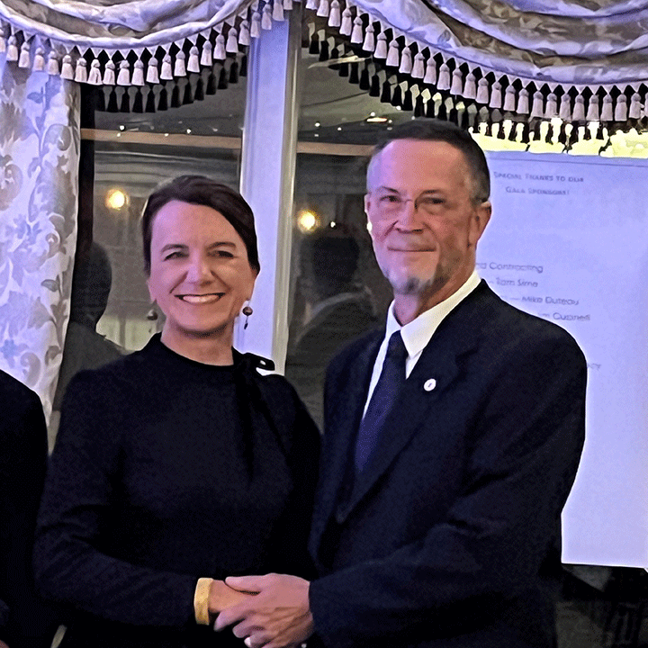 Dr. Karl Williams (left) with Dean Christine Birnie at the Rochester Pharmacy Gala.