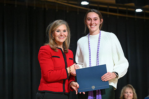 Dean Tricia Gatlin with an award winner.