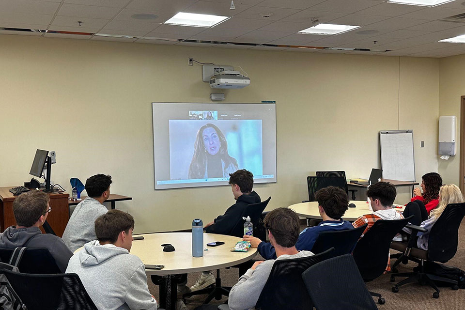 AMA students listen to a guest speaker during Marketing Week 2024.