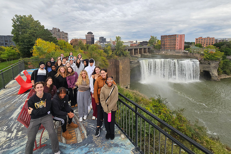 First-year students at Fisher tour the High Falls area of downtown Rochester.