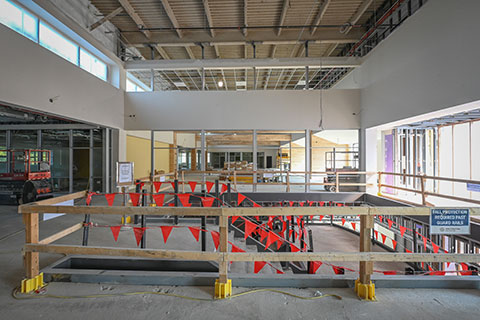 Construction on the second floor of Lavery Library includes a large, open staircase.