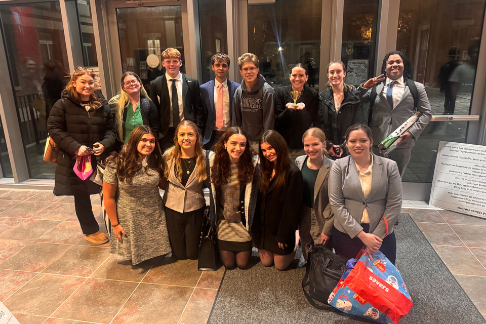 The 2025 Mock Trial Team poses with their award.