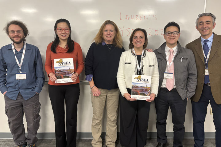 Fisher faculty who helped organize the economics conference.