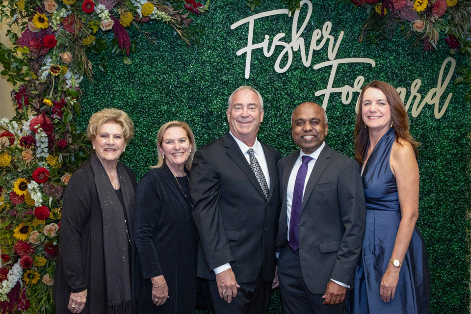 Lucy Malmberg and Dean Christine Birnie and their families at the Fisher Forward Celebration.