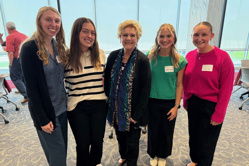 Fisher students pose with Lucy Malmberg.