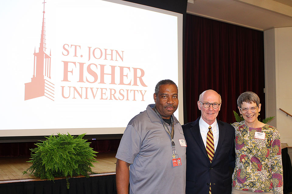 President Rooney with employees celebrating 35 years of service.