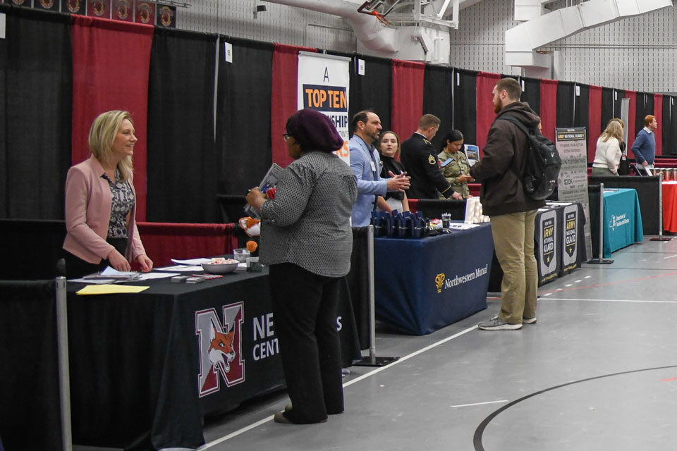 Students chat with prospective employers at the 2024 Career Fair.