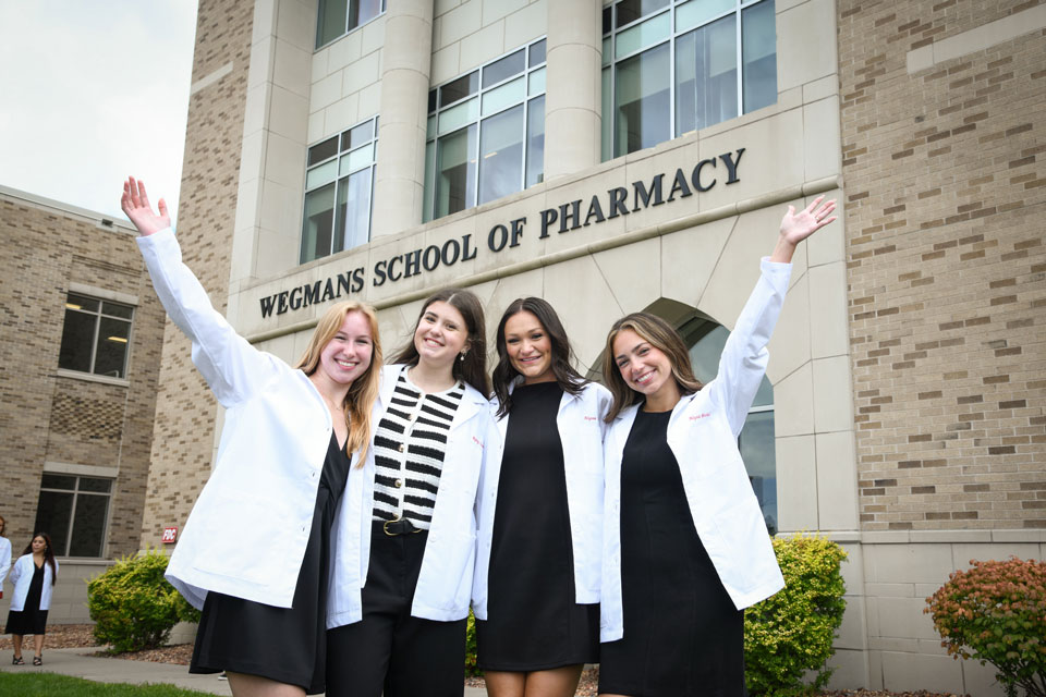 First-year students pose in their white coats.
