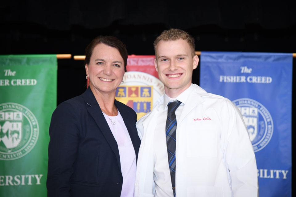 Dean Christine Birnie with a first-year pharmacy student.