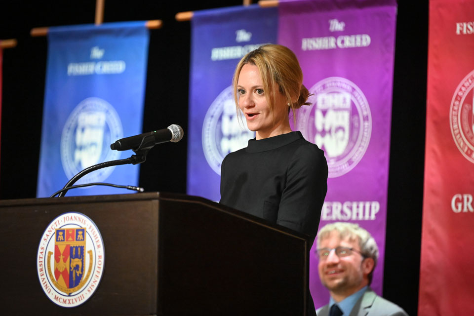 Dr. Dina Jazrawi, executive director of the New York State Board of Pharmacy, delivers the keynote address at the White Coat Ceremony.
