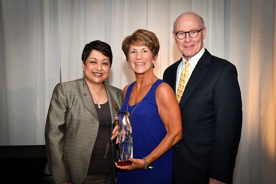 Dean Rama Yelkur, Lauren Gleba Burns, President Gerard Rooney