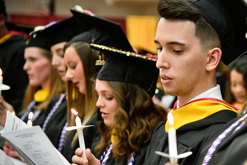 Students light a candle and recite the Nightingale Pledge, a modified version of the Hippocratic Oath named in honor of Florence Nightingale.