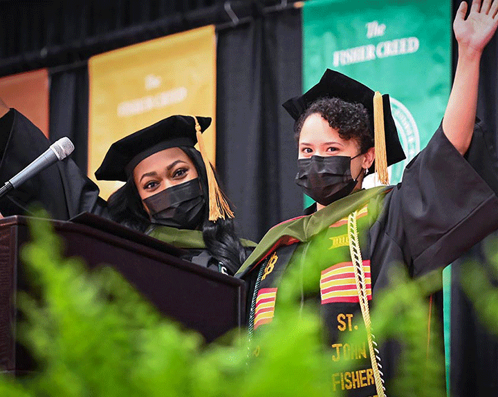 Brittni Thomas and Albania Mitchell, co-presidents of the Class of 2021, offer remarks to their classmates.