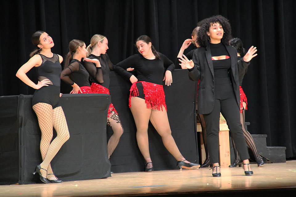 Cast members rehearse for the upcoming production of Chicago.