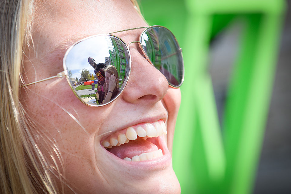 A student smiles during Fisher Fever.