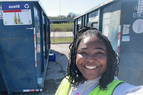 Online pathway student Cierra Patrick volunteers at Red Bridge Recycling Center.