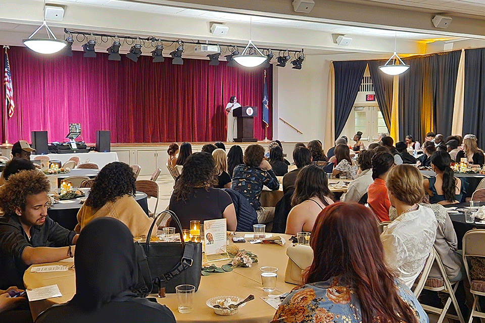 Guests listen to a speaker at the 2023 Spirit of Identity Week MLK Gala.