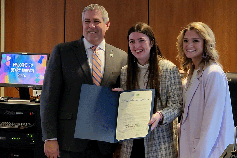 County Executive Adam Bello with students Emily Sullivan and Grayce Trimboli.