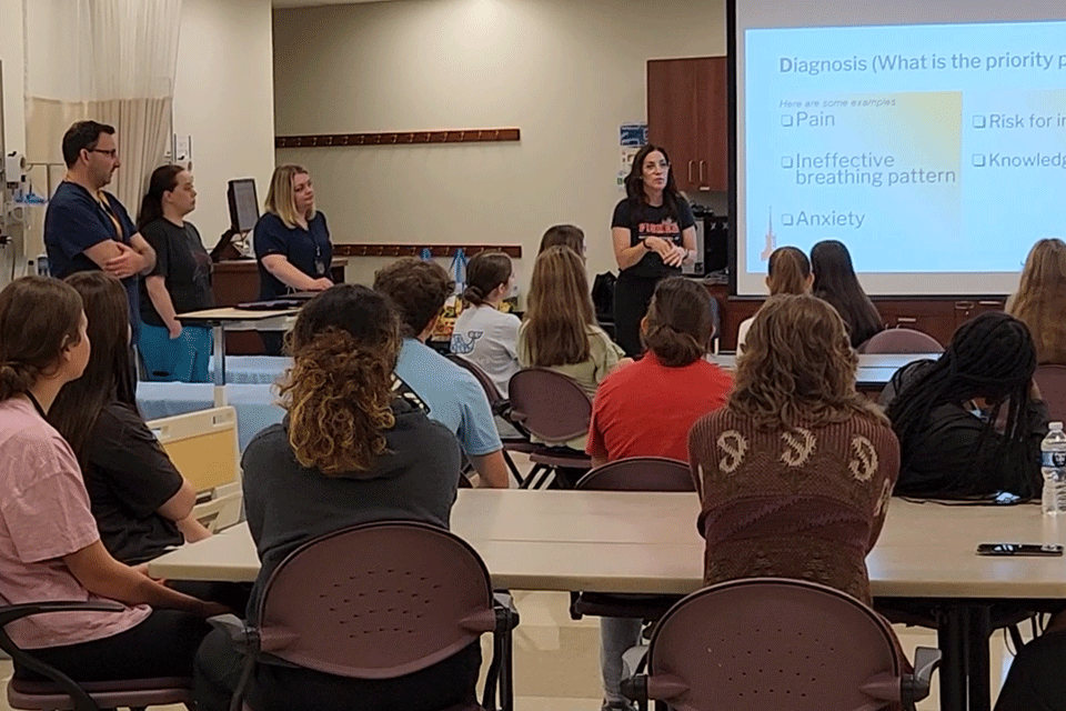 Fisher faculty members lead a session during the Cardinal Nurse Camp.