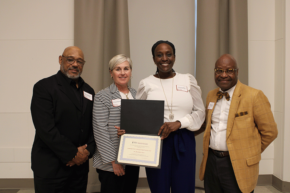 Dr. Pam Mapstone (two from the left) with three members of Mt. Olivet Baptist Church.