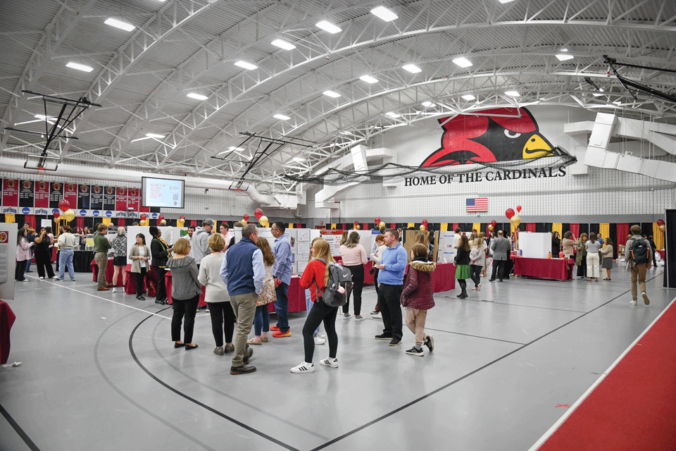 Students gathered and interacting during the annual Fisher Showcase