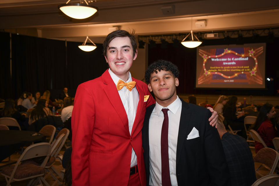 Two students celebrate at the 2025 Cardinal Awards.