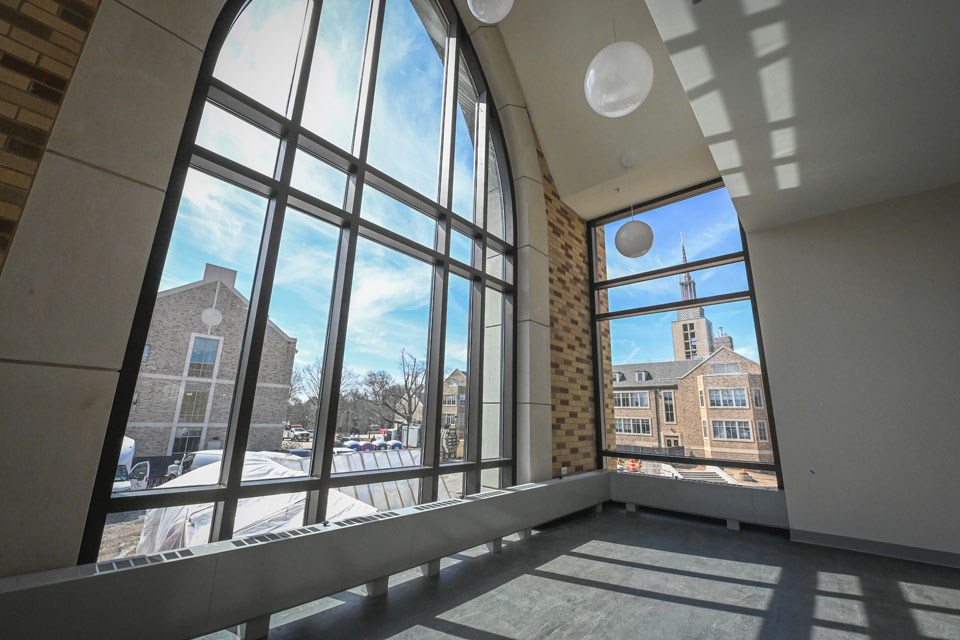 Floor to ceiling windows within Lavery Libary provide stunning view of Kearney Hall.