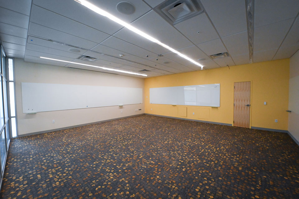 Bright walls create a welcoming space inside Lavery Library.