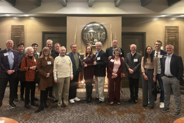 Alumni gather for a group photo in Arizona