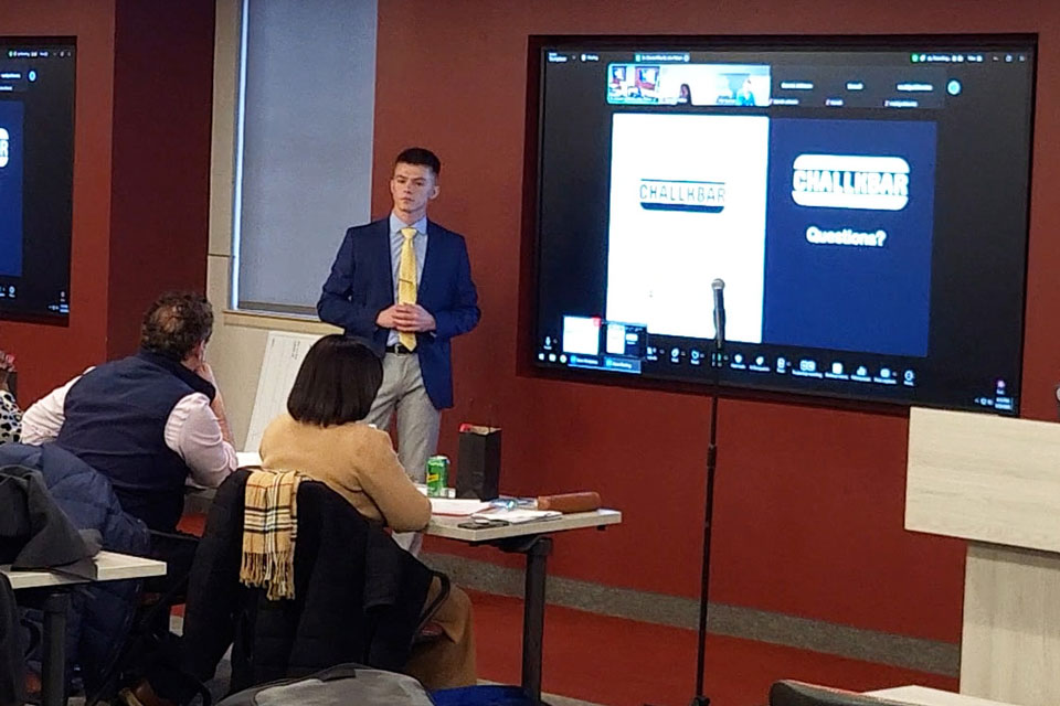 Brennan Conn presents his business idea.