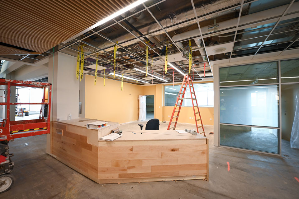 The new front desk at Lavery Library is open, airy, and welcoming.