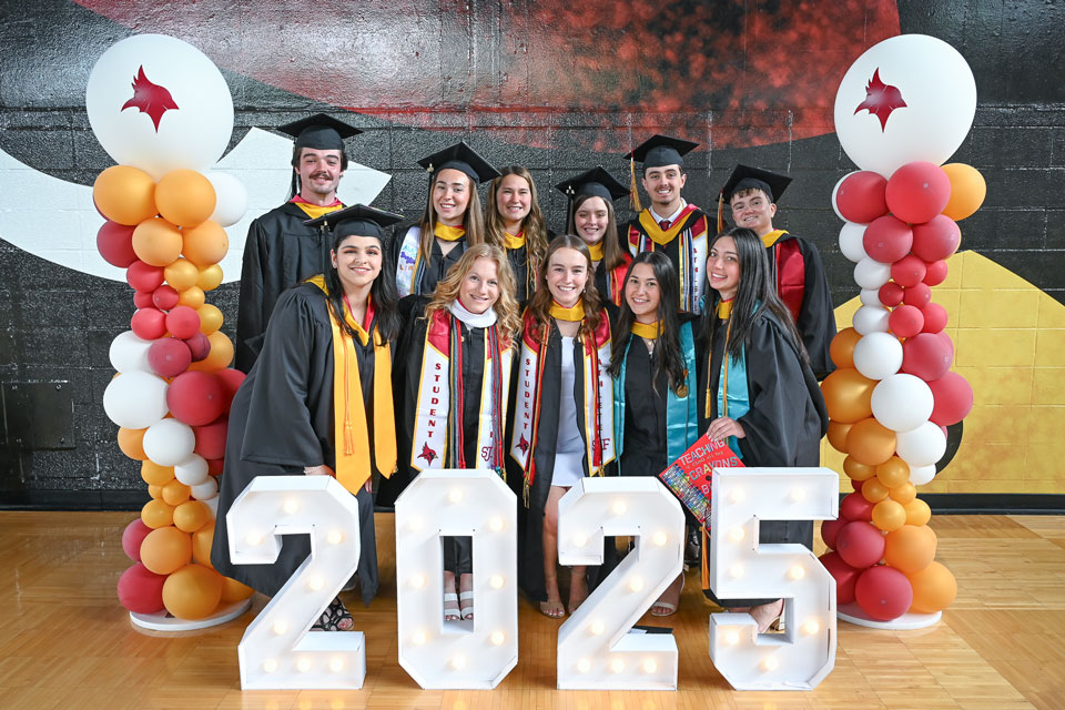 Members of the Class of 2025 pose at Commencement.