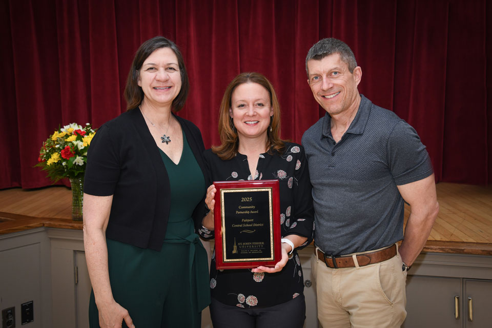 Dr. Whitney Rapp with representatives from Fairport Central School District.