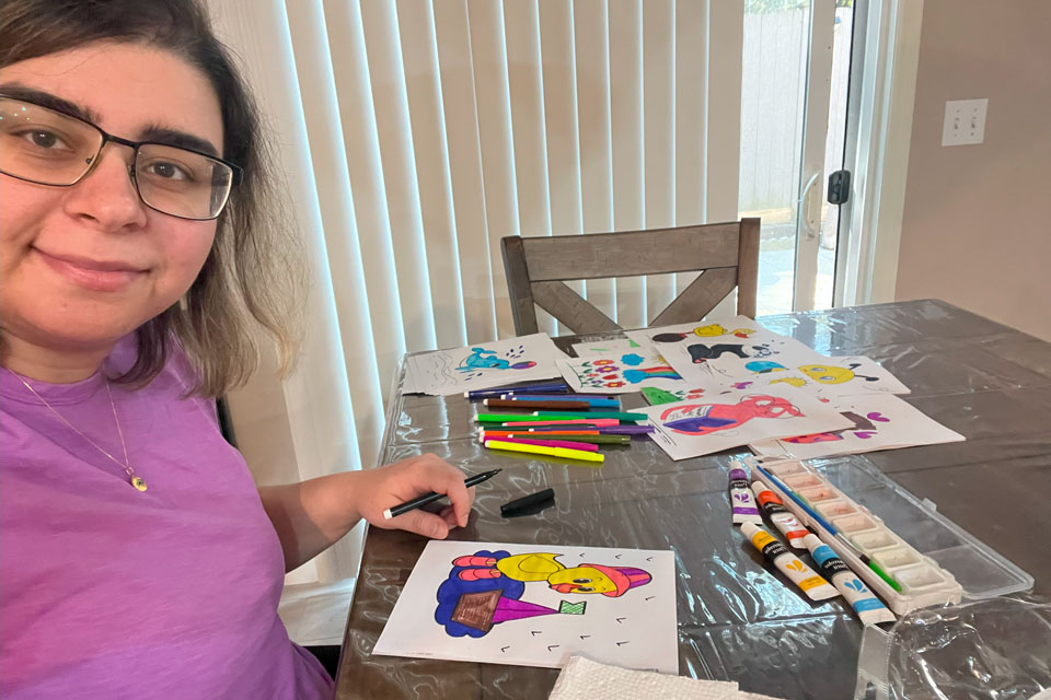 Mahtab Tirandazian creates colorful pictures during Service Day.