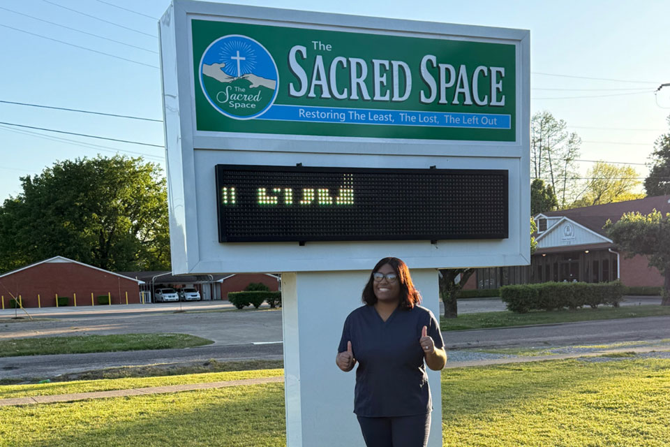A pharmacy students volunteers during Service Day.