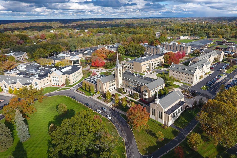 Aerial view of the St. John Fisher University campus in fall.